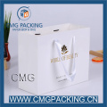 Saco de vestuário de papel branco elegante com logotipo de ouro Hot Stamping